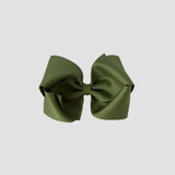 Moss green hair bow on a white background