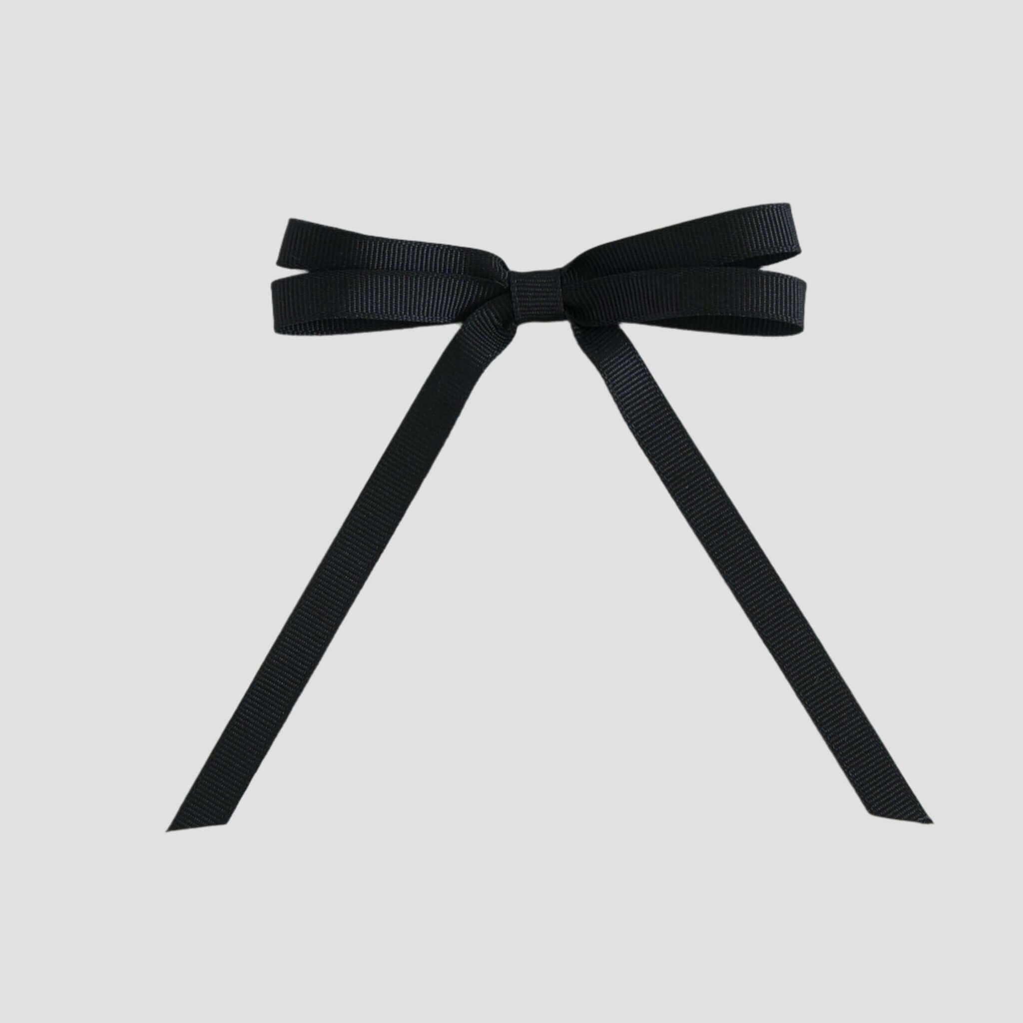 Black grosgrain bow on a white background