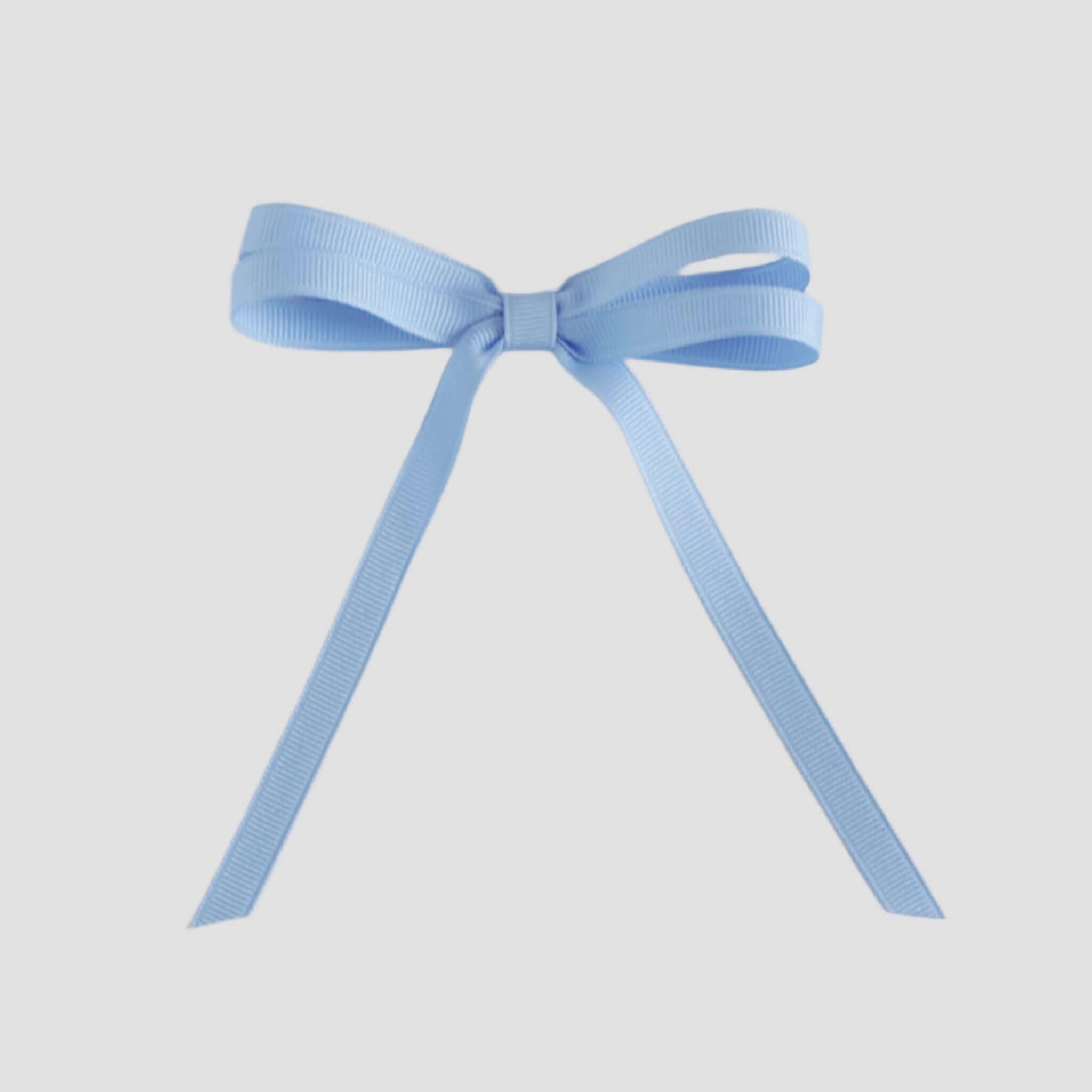 Light blue ribbon bow on a white background