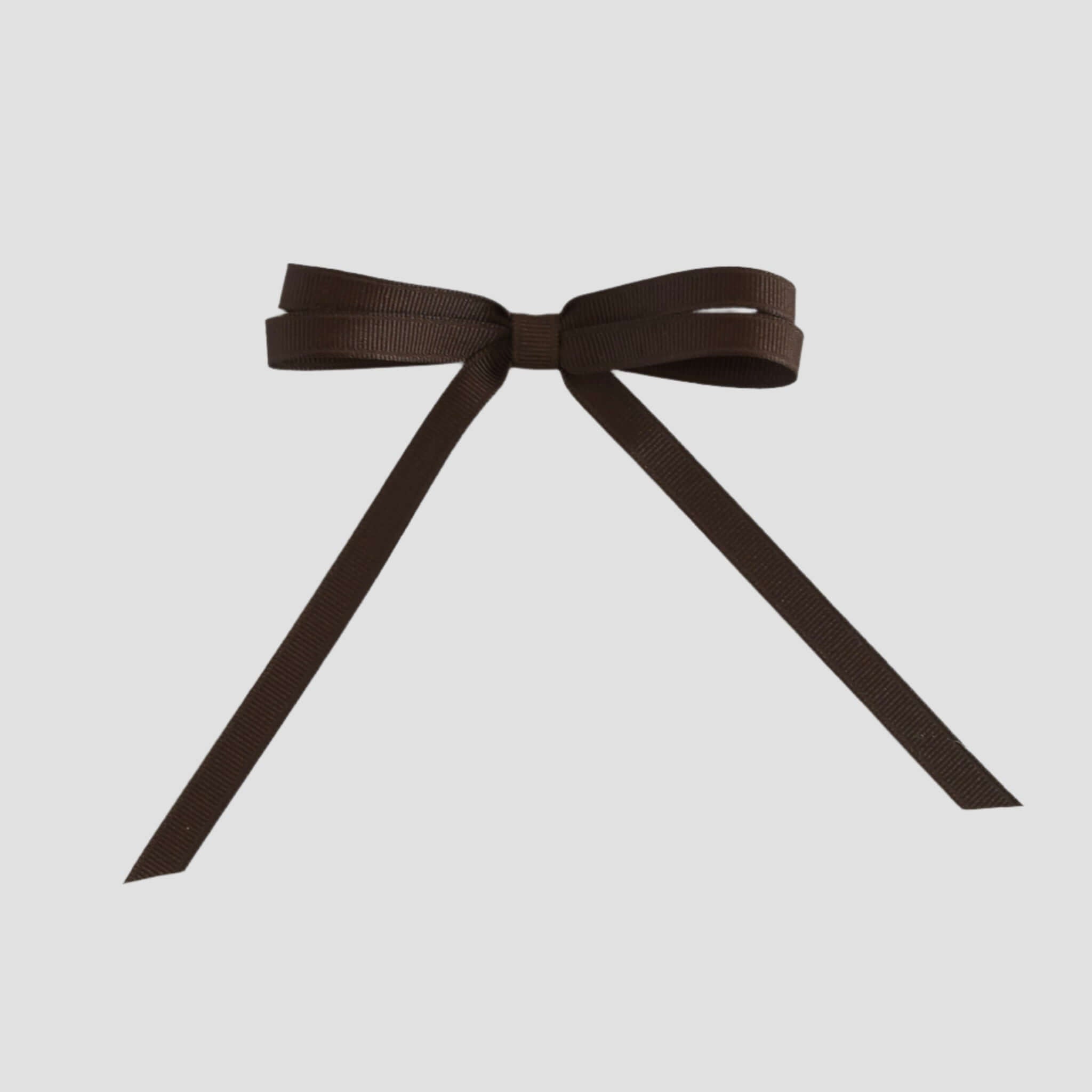 Brown grosgrain ribbon bow on a white background