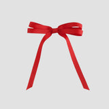 Red grosgrain ribbon bow on a white background