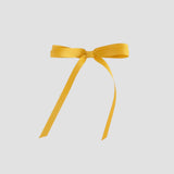 Yellow ribbon bow on a white background