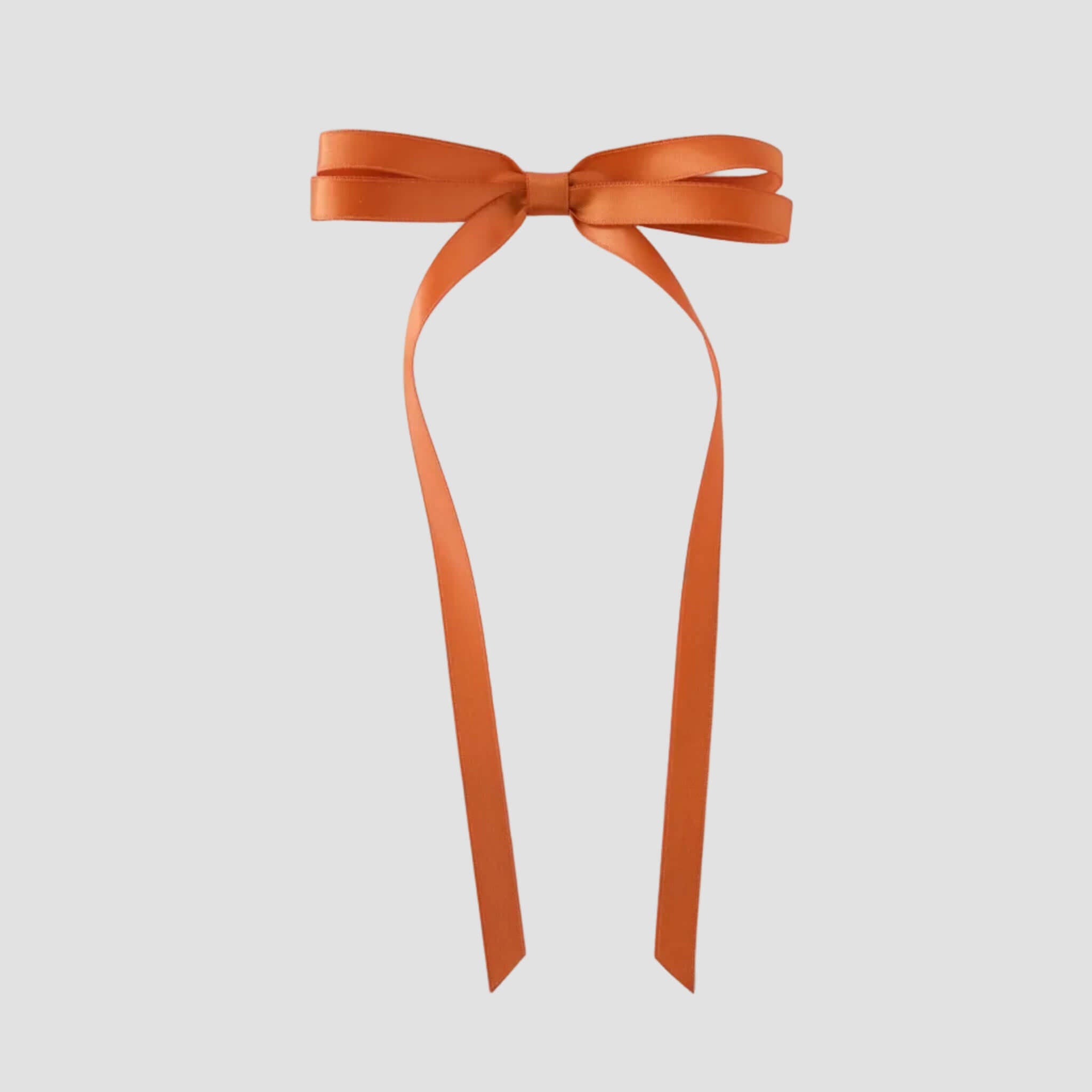 Olivia satin bow in copper orange