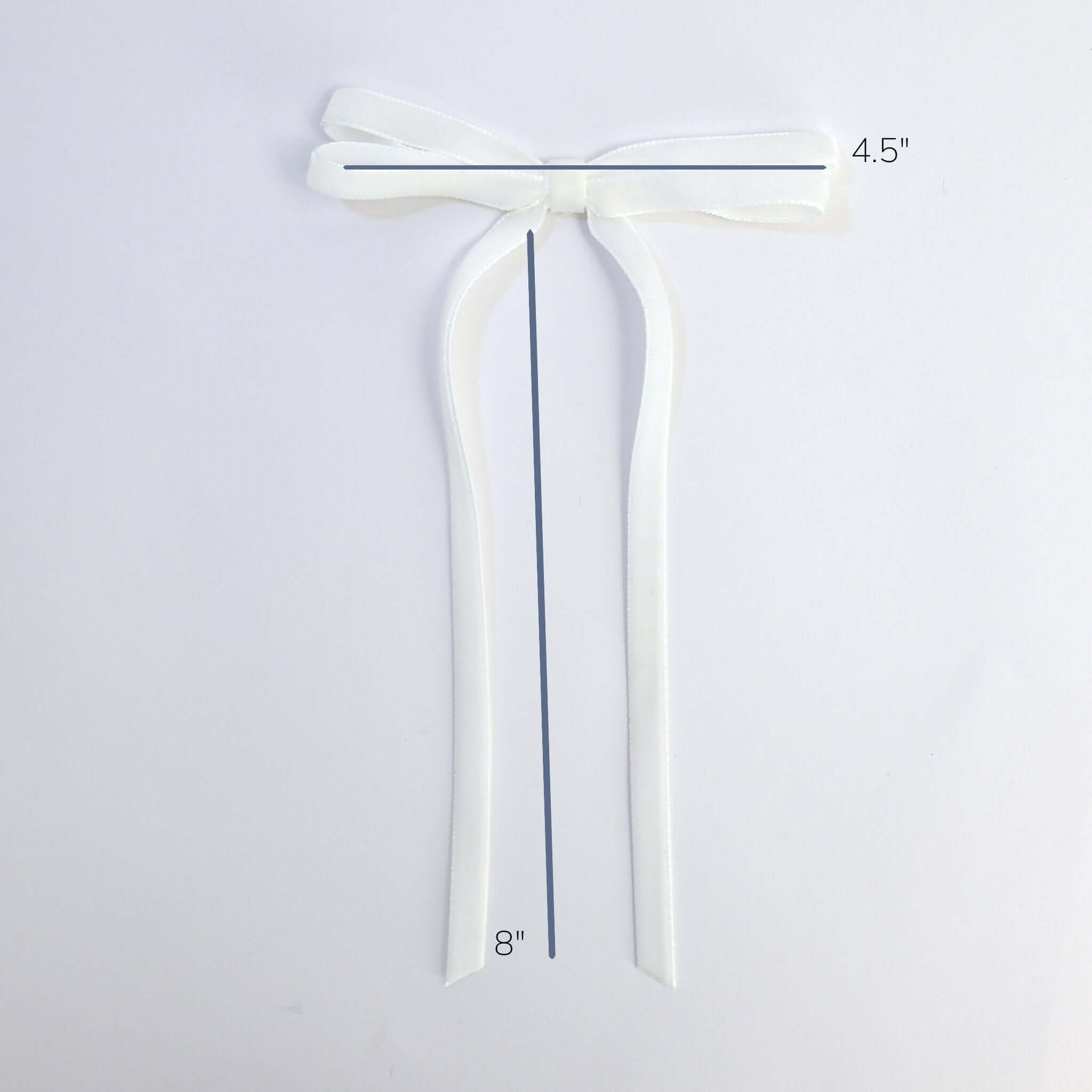 Olivia velvet hair bow for women size guide showing 4.5 inch bow and 8 inch ribbon tails
