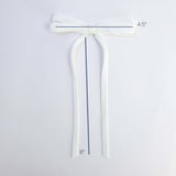 Olivia velvet hair bow for women size guide showing 4.5 inch bow and 8 inch ribbon tails