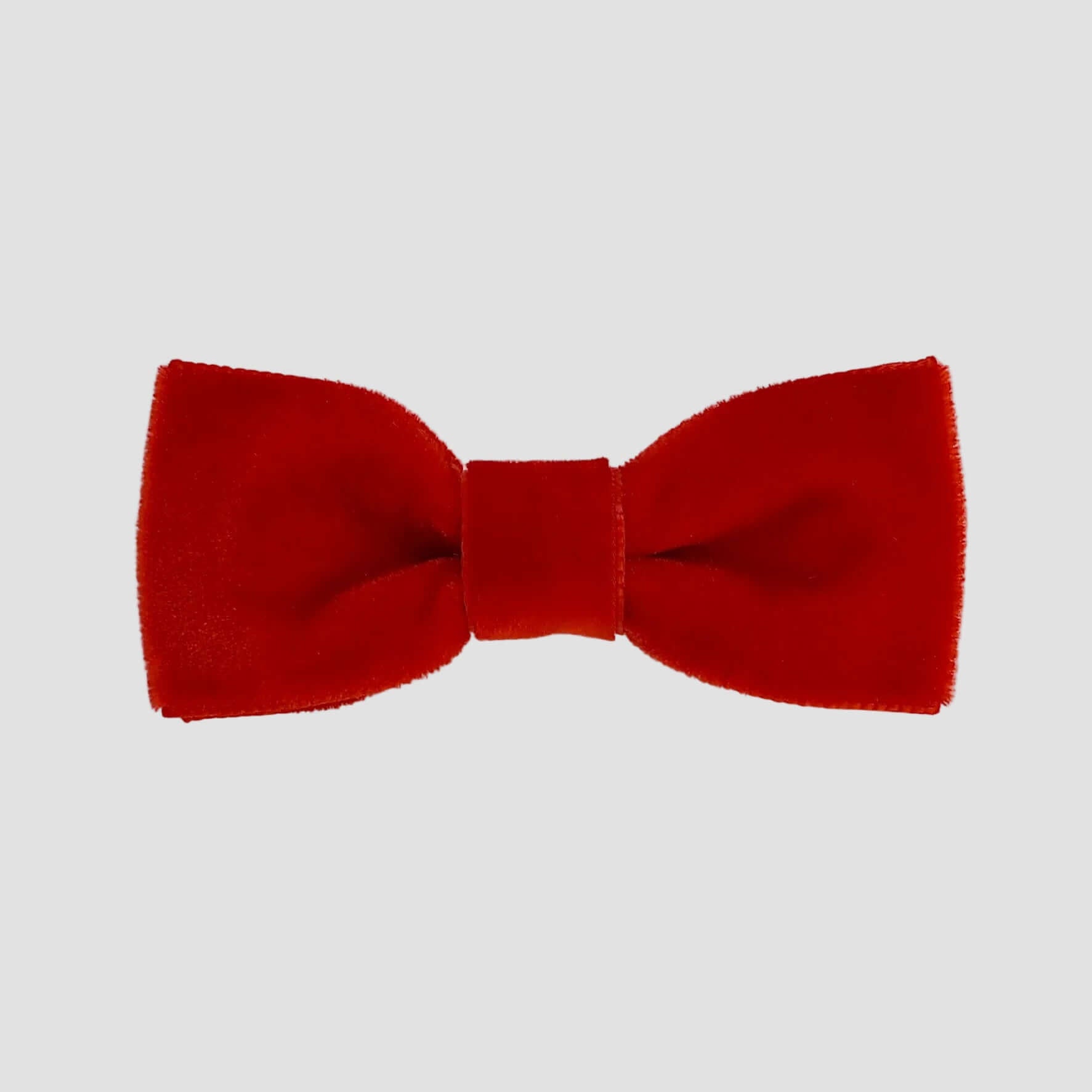 0-24 mos Red velvet bow tie on a white background