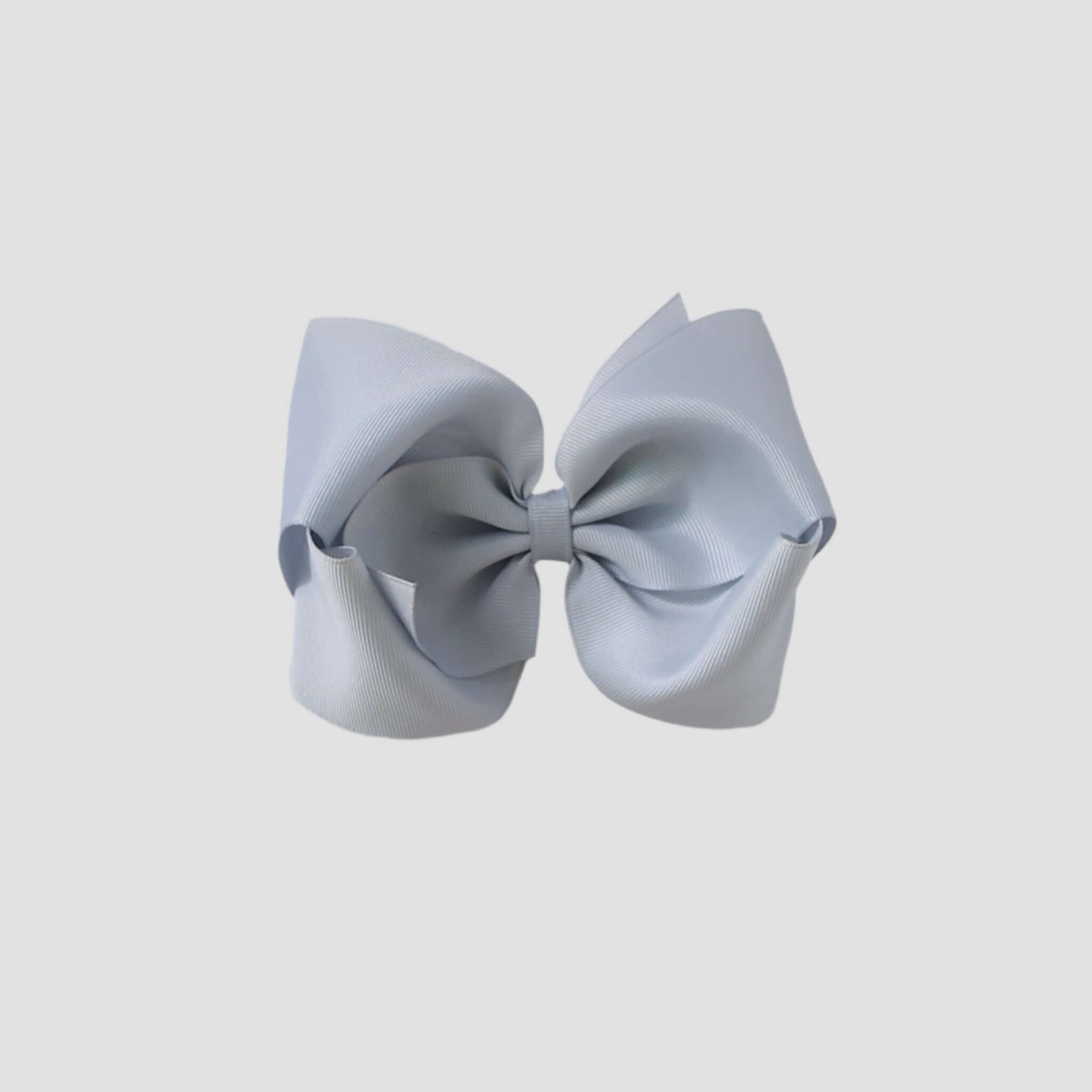 silver gray hair bow on a white background