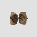 Taupe hair bow on a white background