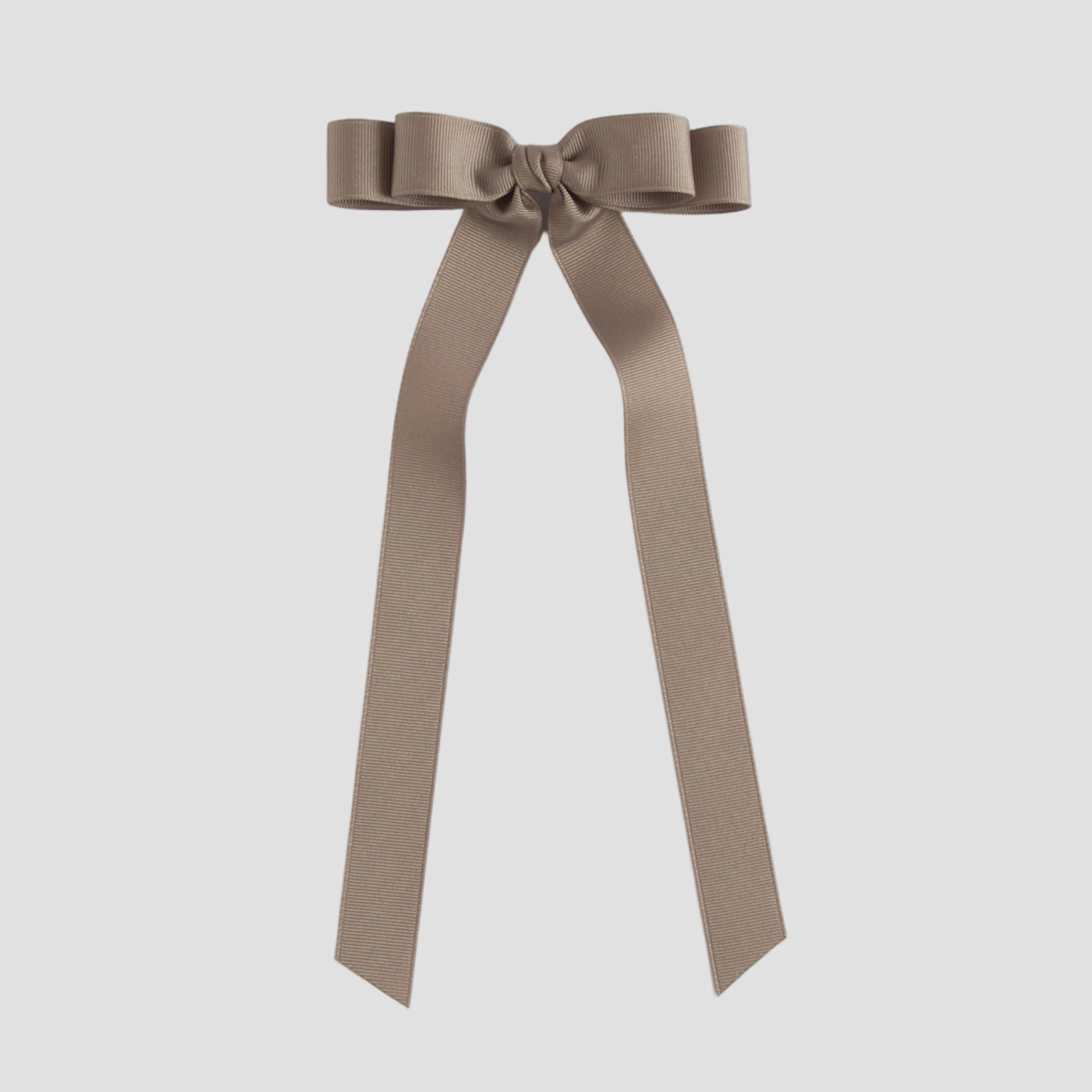 Taupe brown ribbon bow on a white background