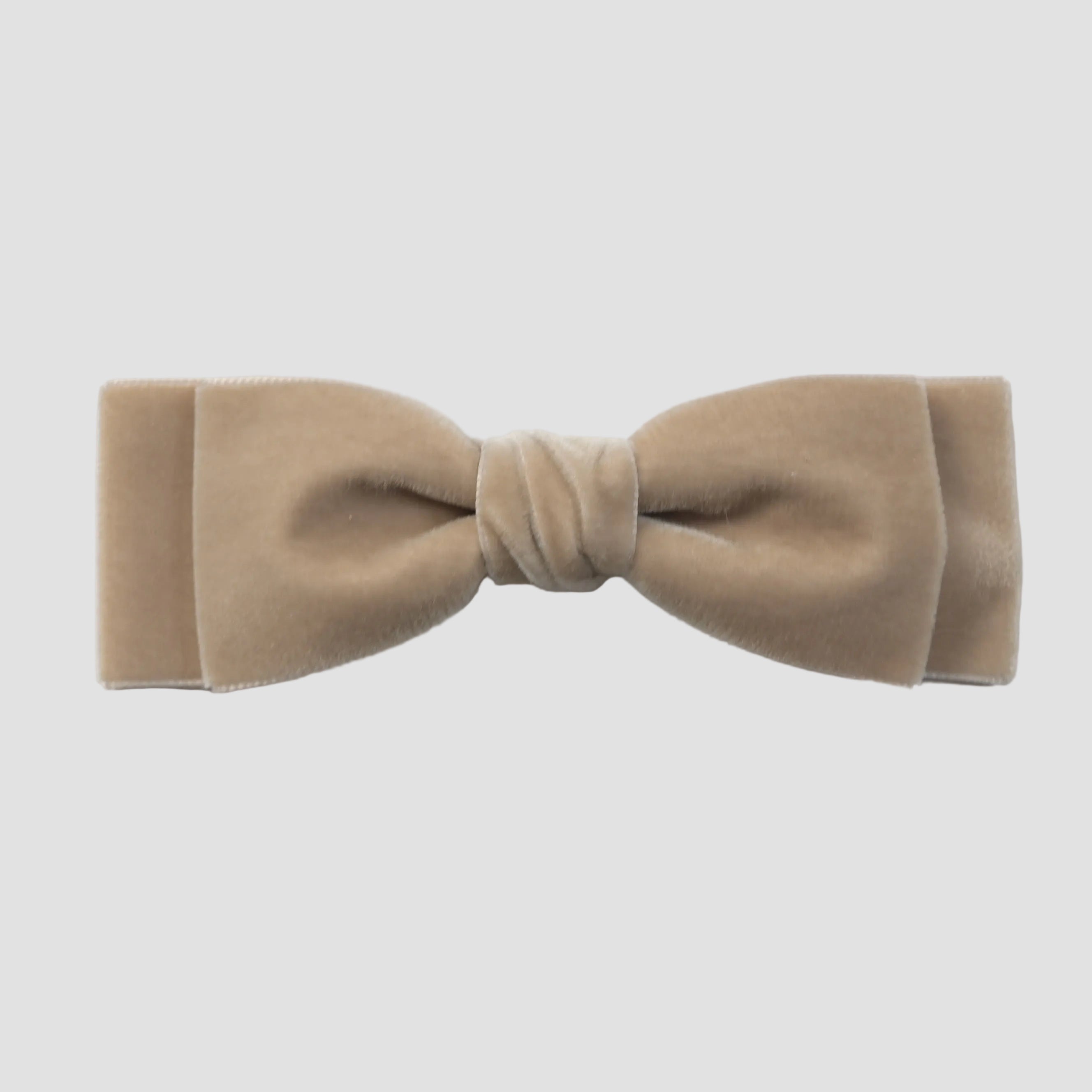 Taupe velvet Ava hair bow on a white background