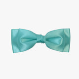 Ava satin bow in tropic blue on a white background.