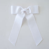 White grosgrain Zoe Petite bow on a white background