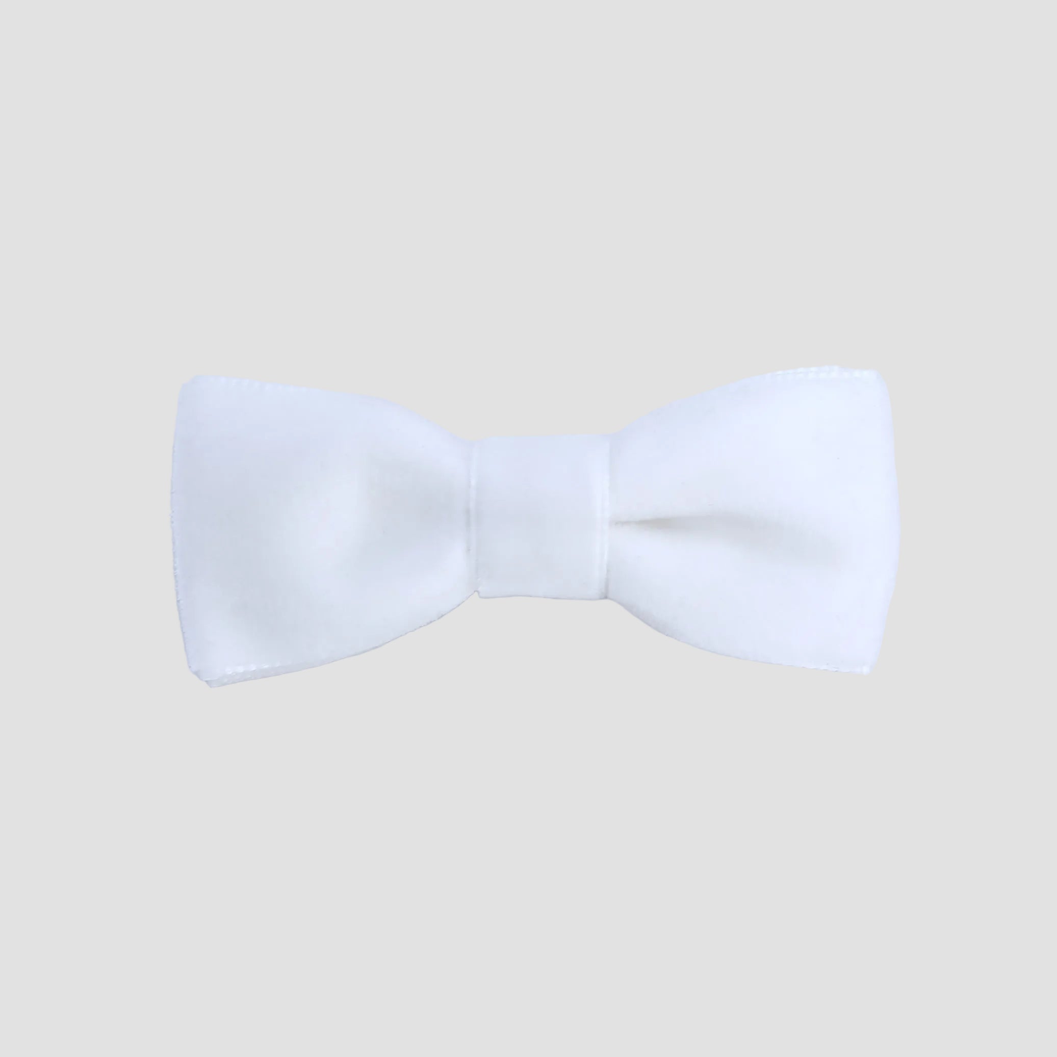 0-24 mos White velvet bow tie on a white background