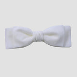 White velvet hair  bow on a white  background