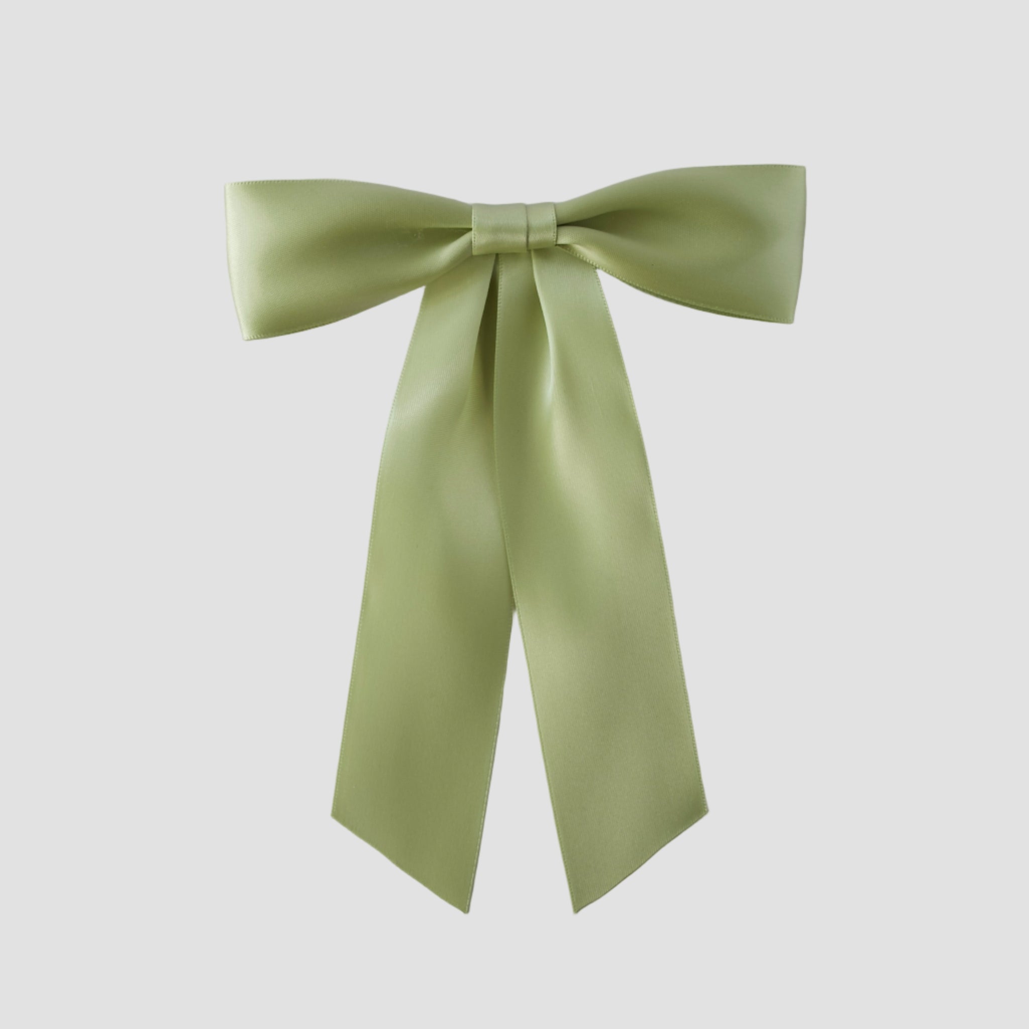 Celadon Green Zoe petite satin hair bow on a white background