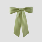 Celadon Green Zoe petite satin hair bow on a white background