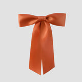 Copper Zoe petite satin hair bow on a white background