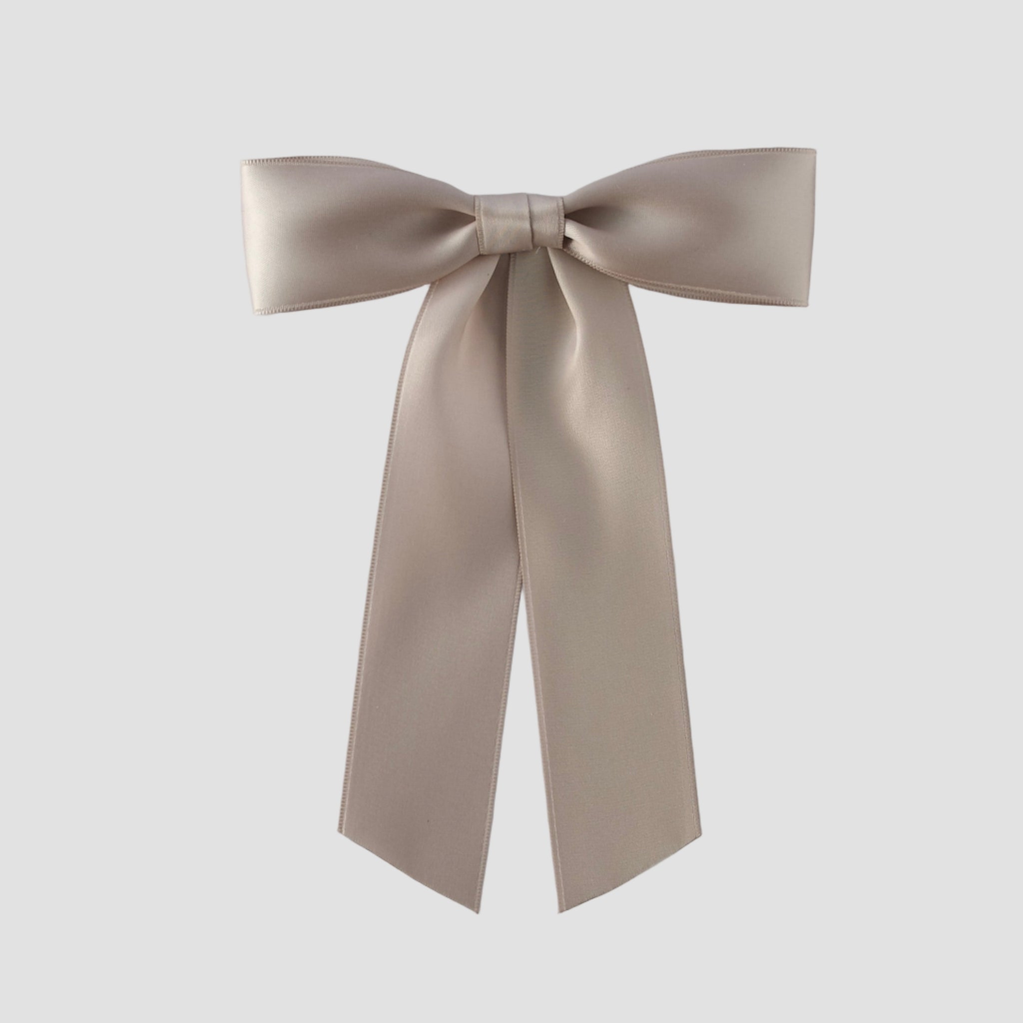 Zoe petite satin hair bow on a white background