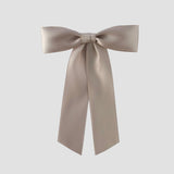 Zoe petite satin hair bow on a white background