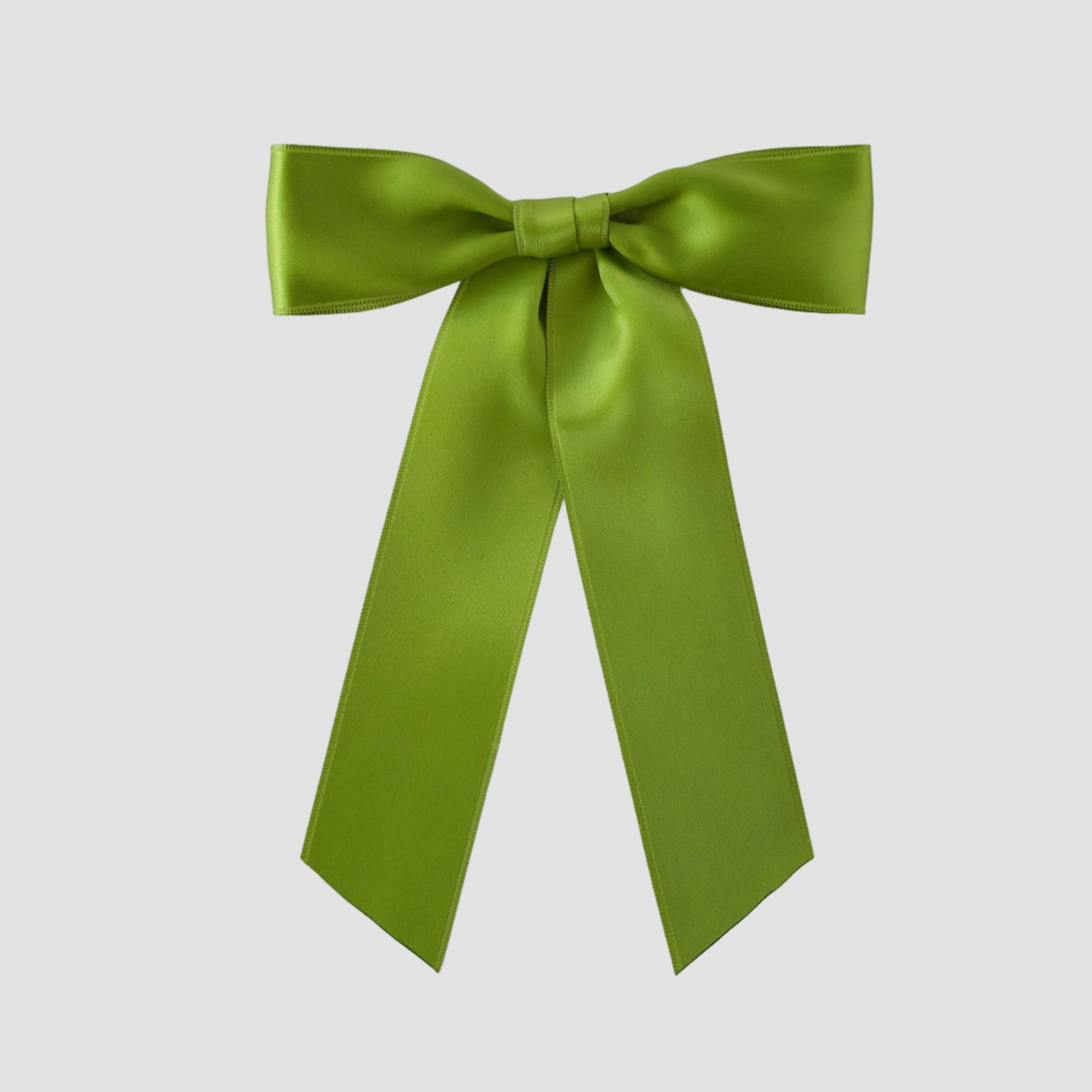Leaf Green Zoe petite satin hair bow on a white background