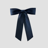 Navy Zoe petite satin hair bow on a white background