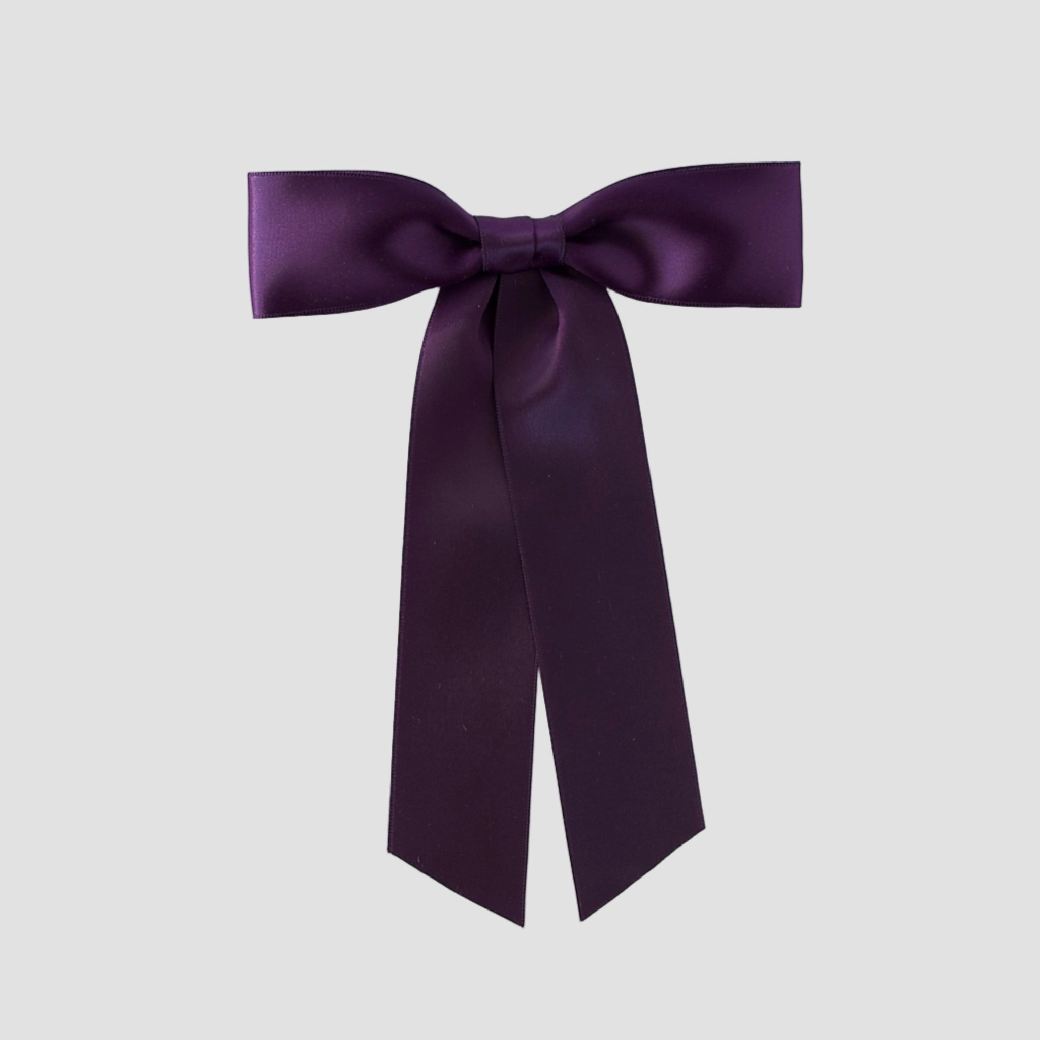 Plum purple Zoe petite satin hair bow on a white background