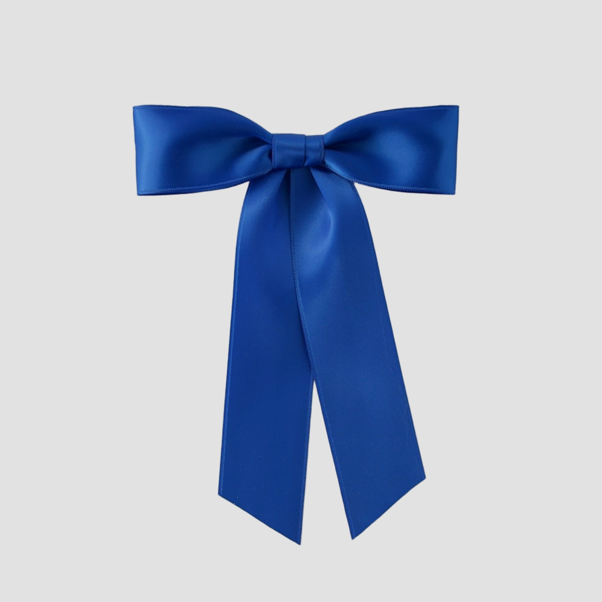 Royal Zoe petite satin hair bow on a white background
