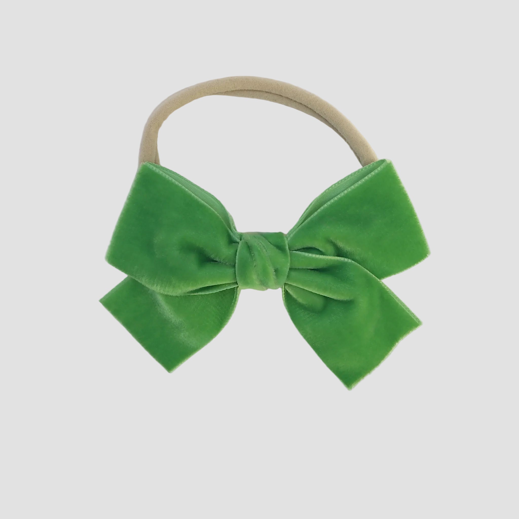Apple green Kayla velvet hair bow headband for baby girl.