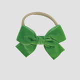 Apple green Kayla velvet hair bow headband for baby girl.