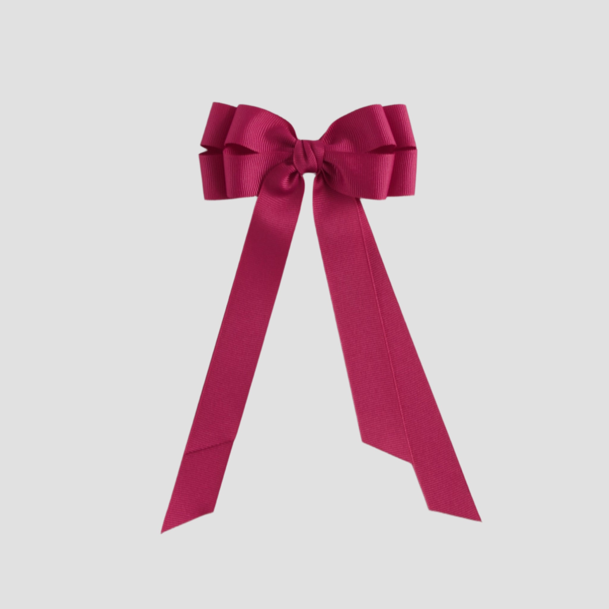 Azalea pink bow on a white background