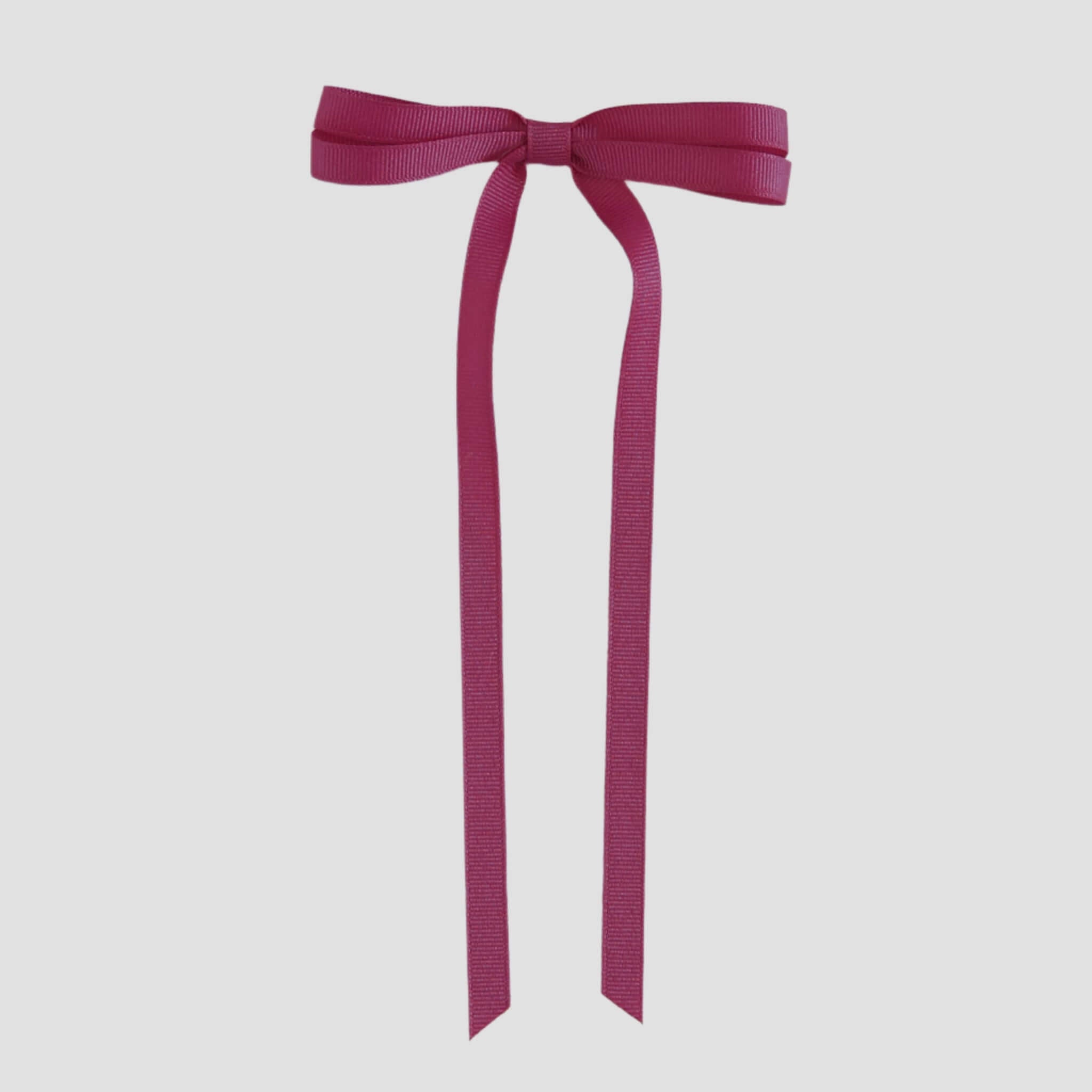 Azalea ribbon bow on a white background
