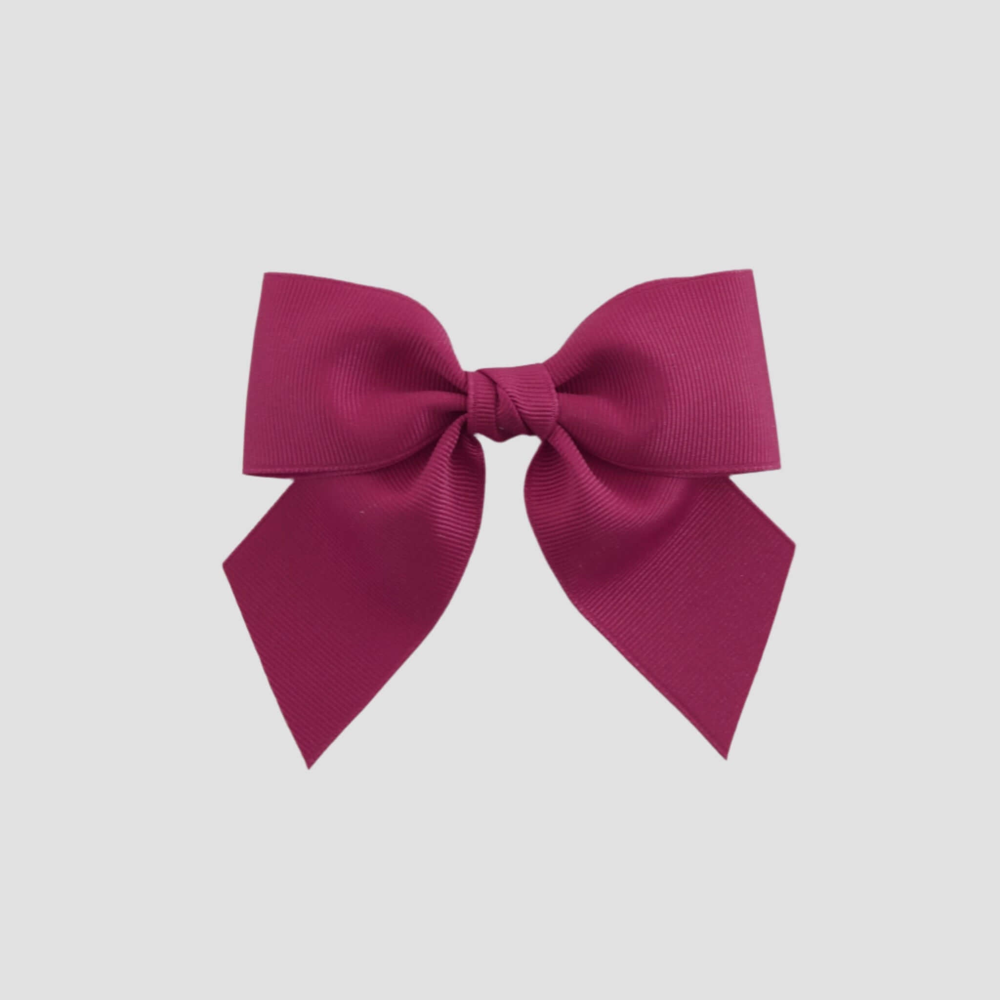 Azalea pink bow on a white background