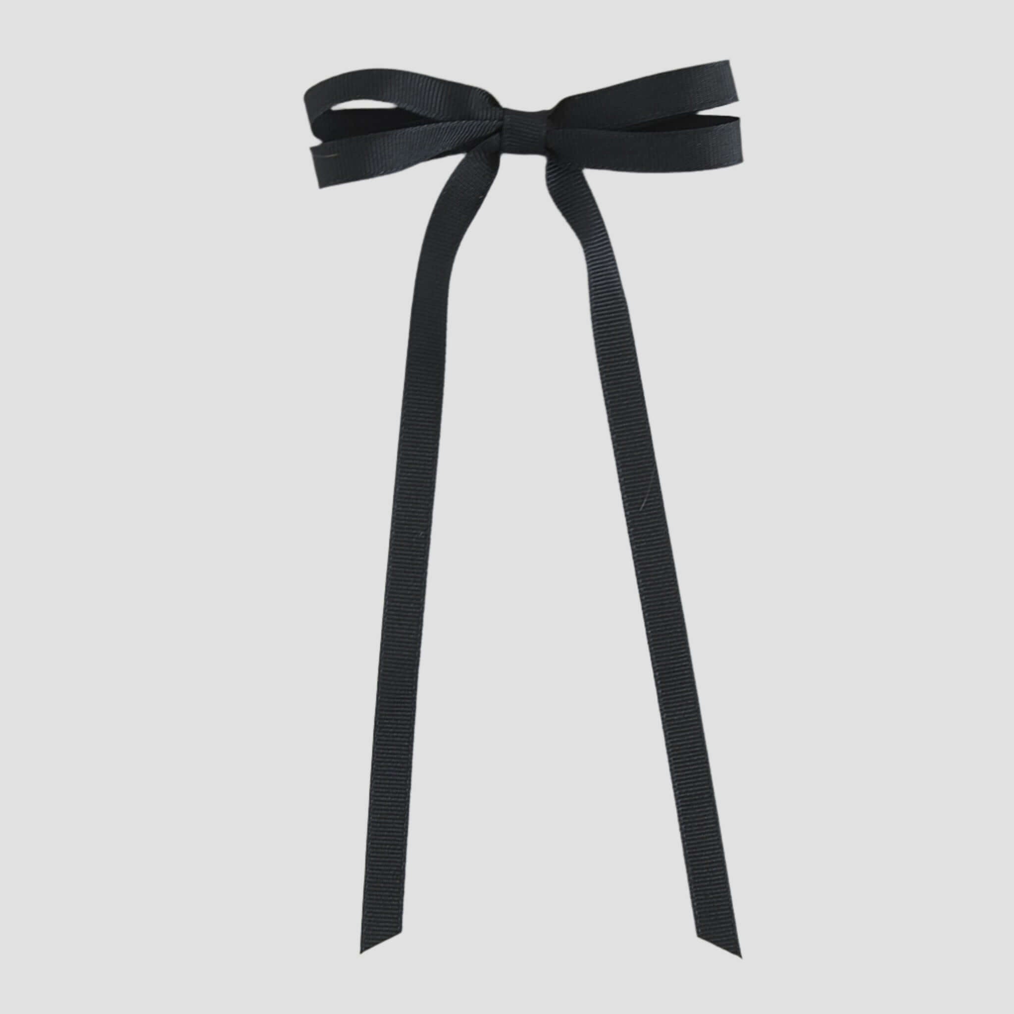 Black ribbon bow on a white background