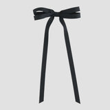 Black ribbon bow on a white background