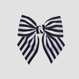 Black and white striped bow on a white background