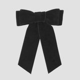 Black velvet Mia bow on a white background