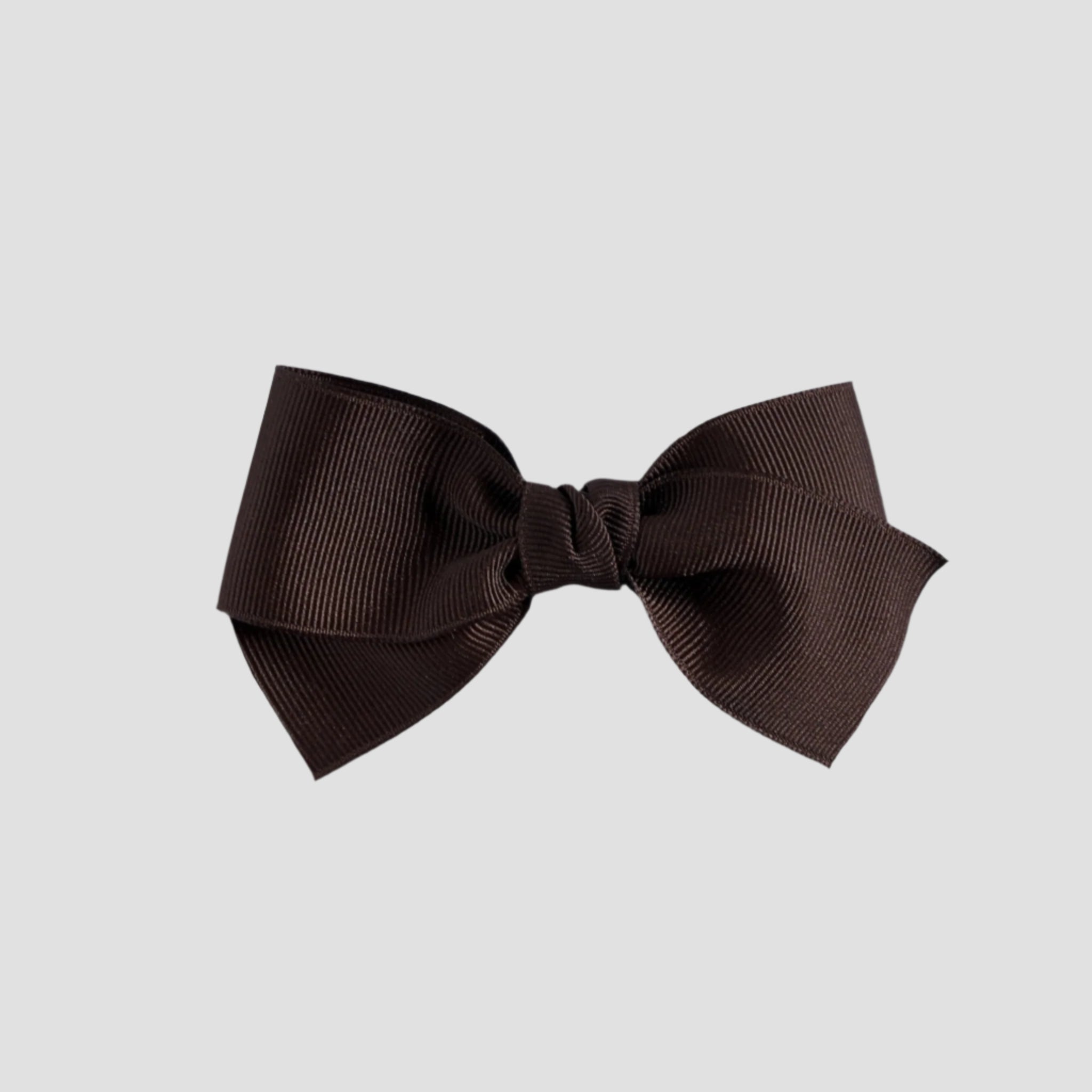 Brown hair bow on a white background