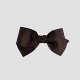 Brown hair bow on a white background