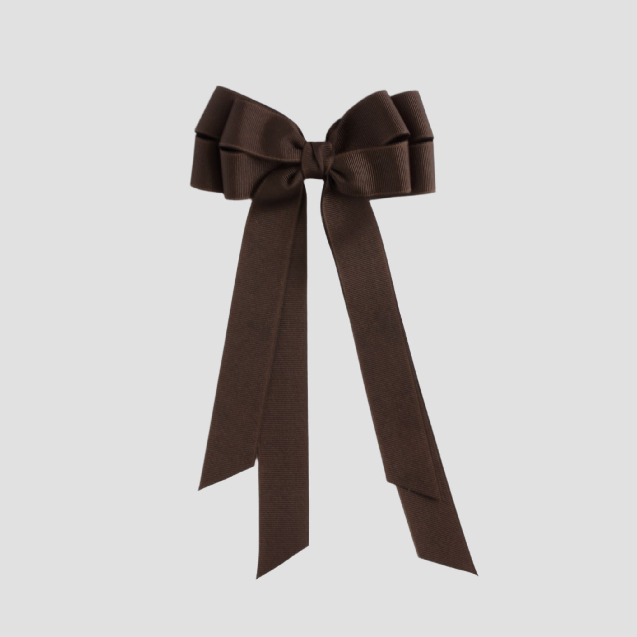 Brown bow on a white  background