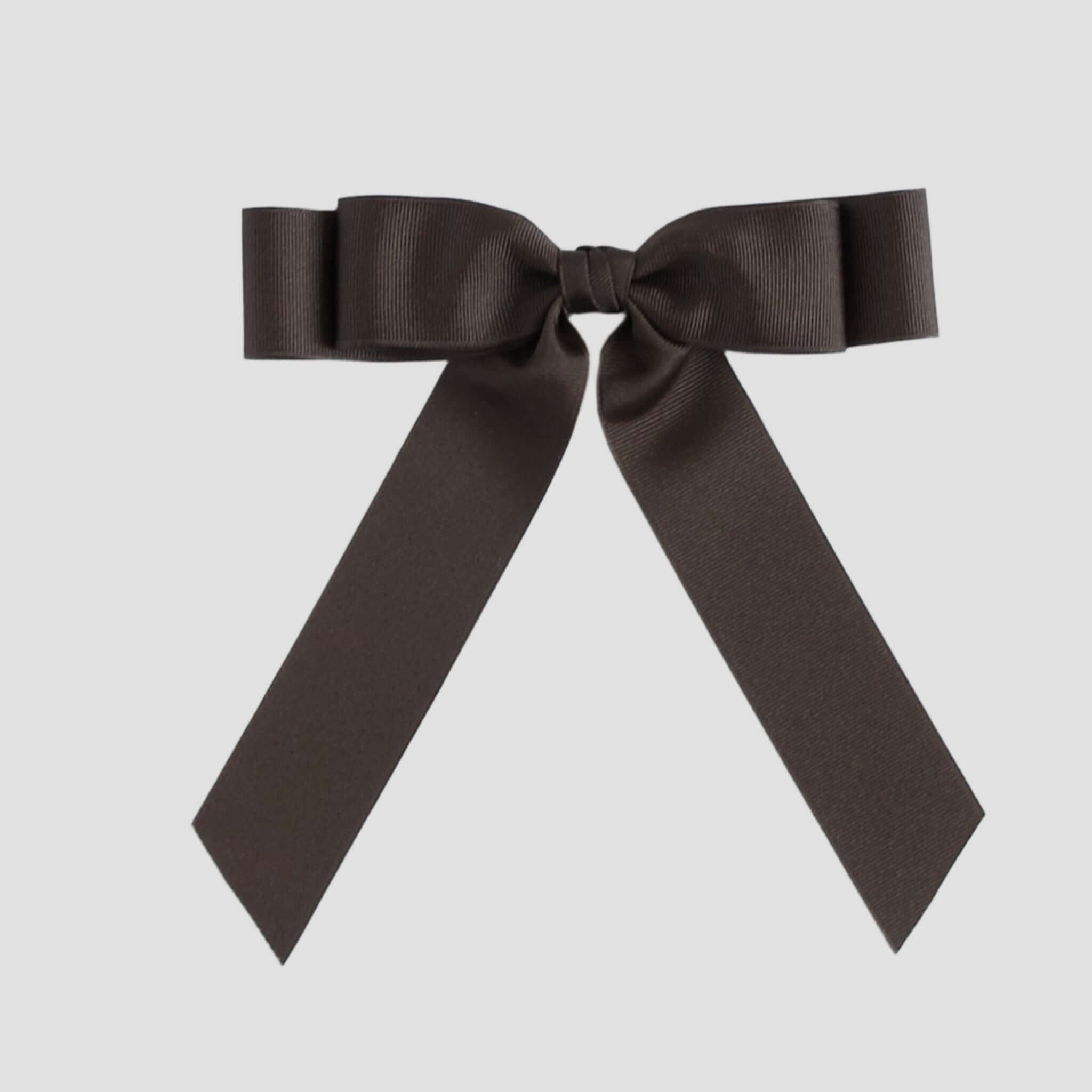 Brown bow on a white background