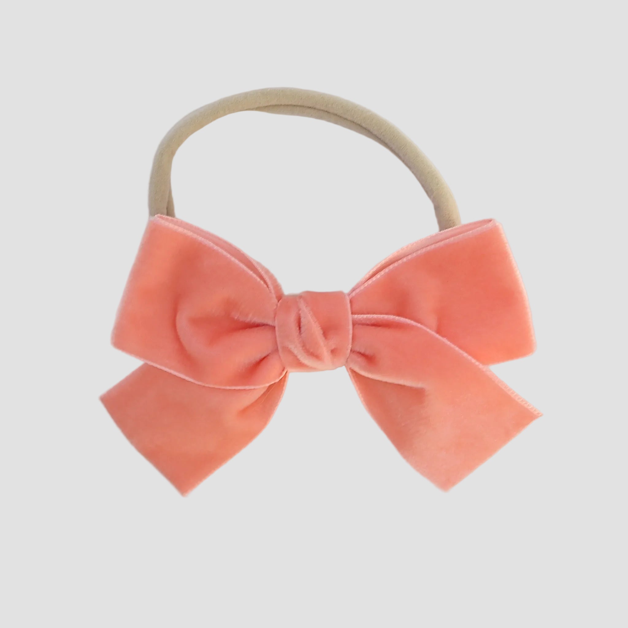 coral Kayla velvet hair bow headband for baby girl.