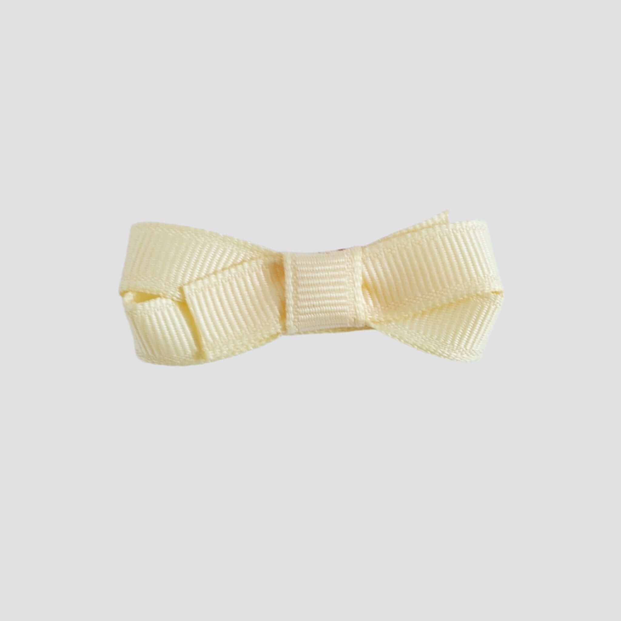 Cream bow on a white background