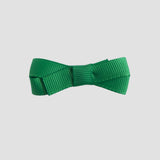 Emerald green bow on a white background