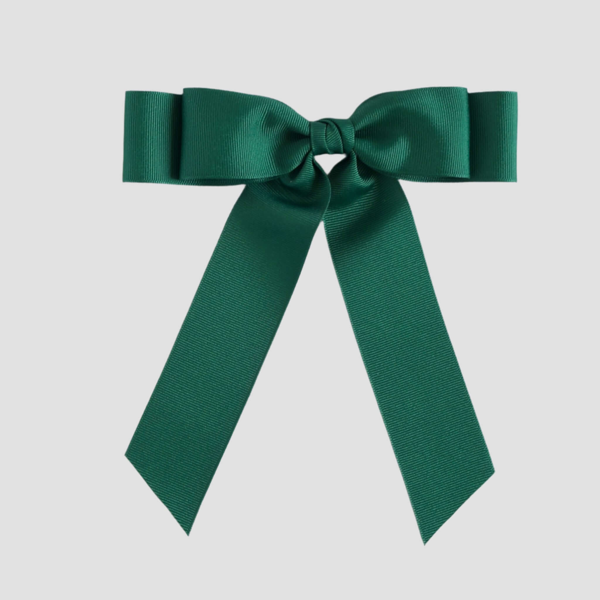 Forest green bow on a white background