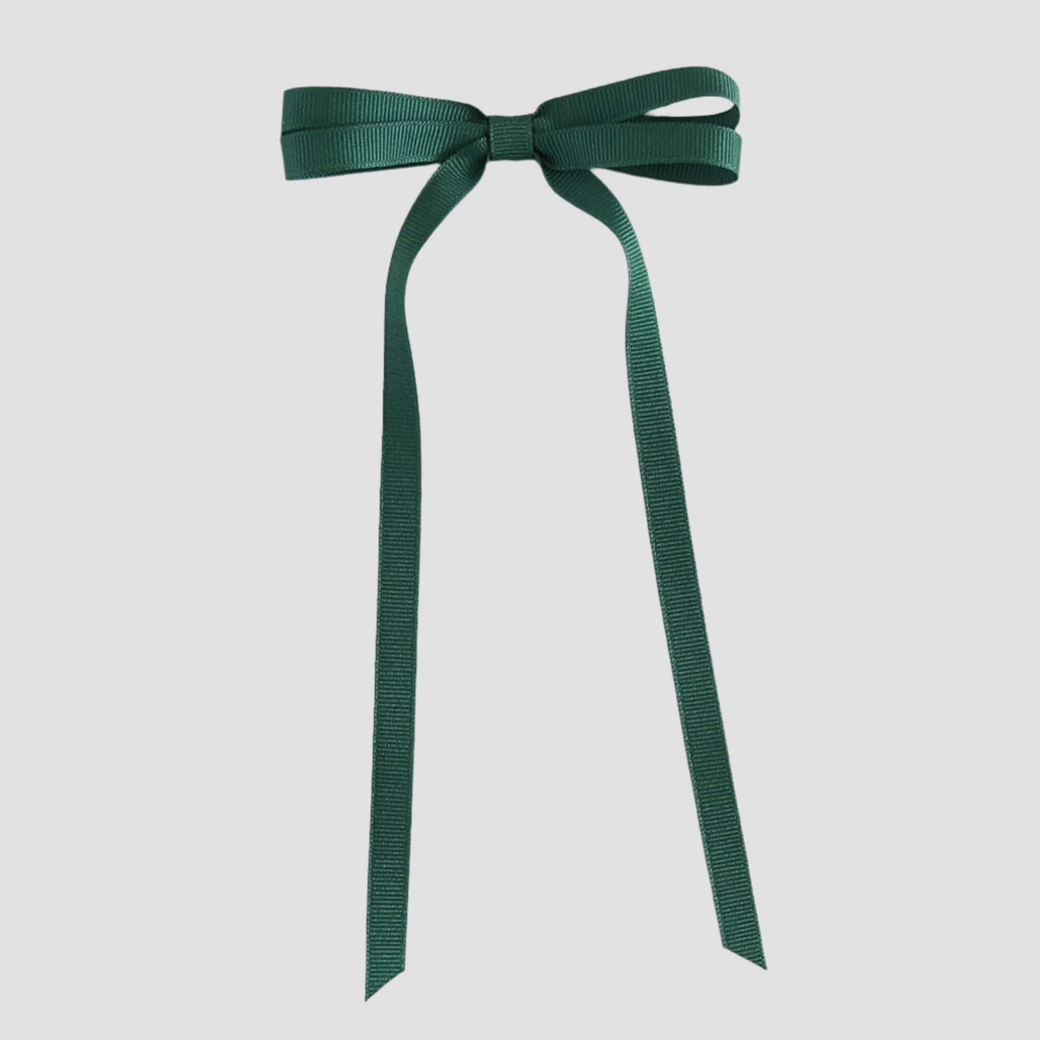 Forest green ribbon bow on a white background