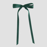 Forest green ribbon bow on a white background