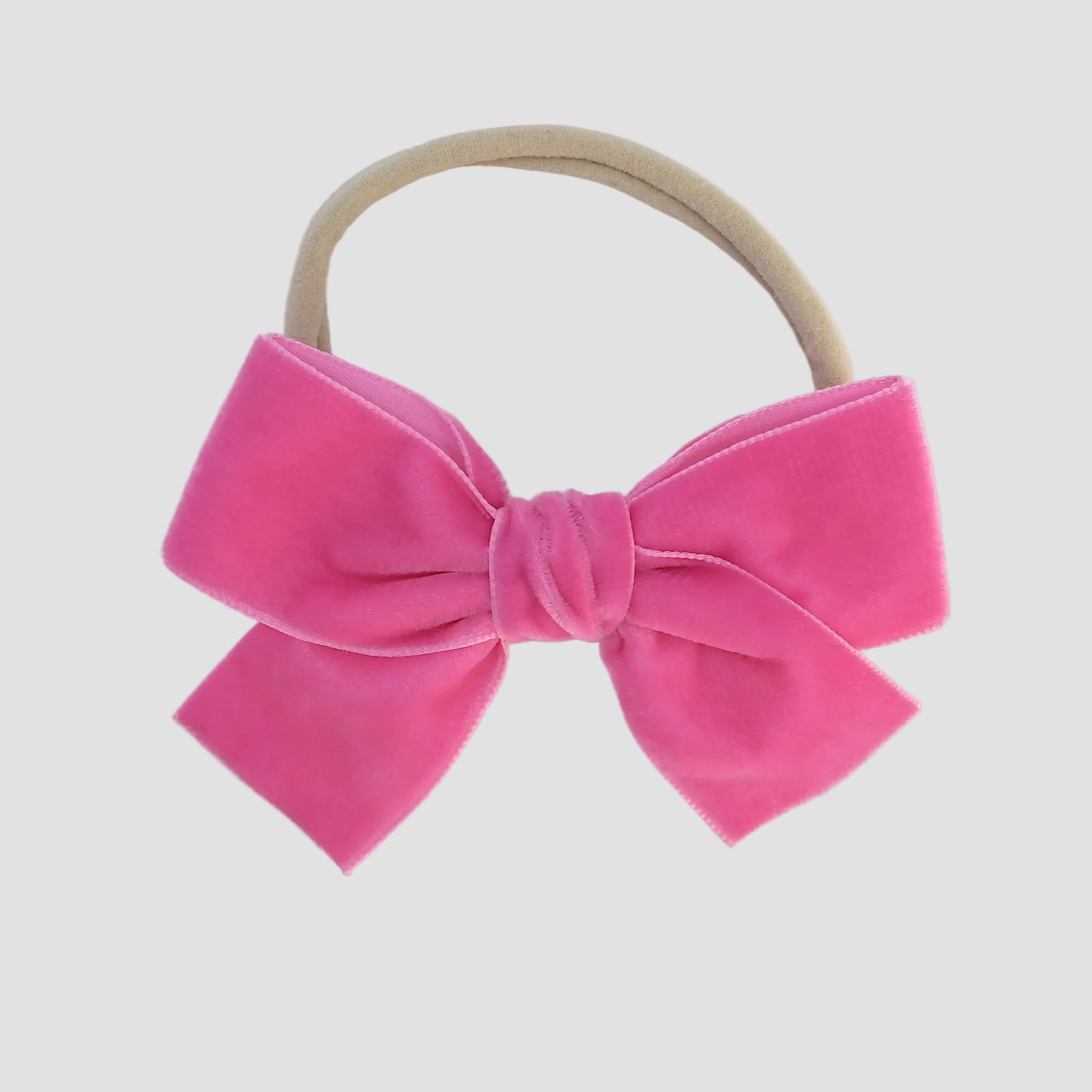hot pink Kayla velvet hair bow headband for baby girl.