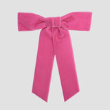 Hot pink Zoe petite velvet hair bow on a white background.