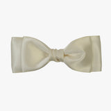 Ava satin bow in ivory on a white background