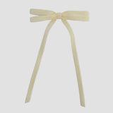 Ivory Olivia velvet hair bow for women with long tails on white background